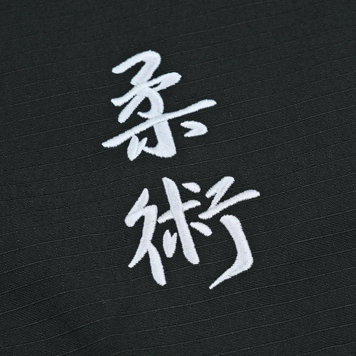 Zbliżenie na japoński napis kanji Jiu-Jitsu na spodenkach Ground Game Ripstop