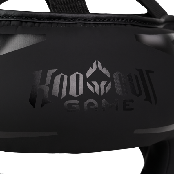 Logo Ground Game na boku czarnego kasku bokserskiego z szyną Stripe Black